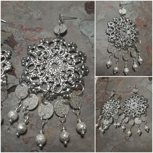 Being blind earrings.